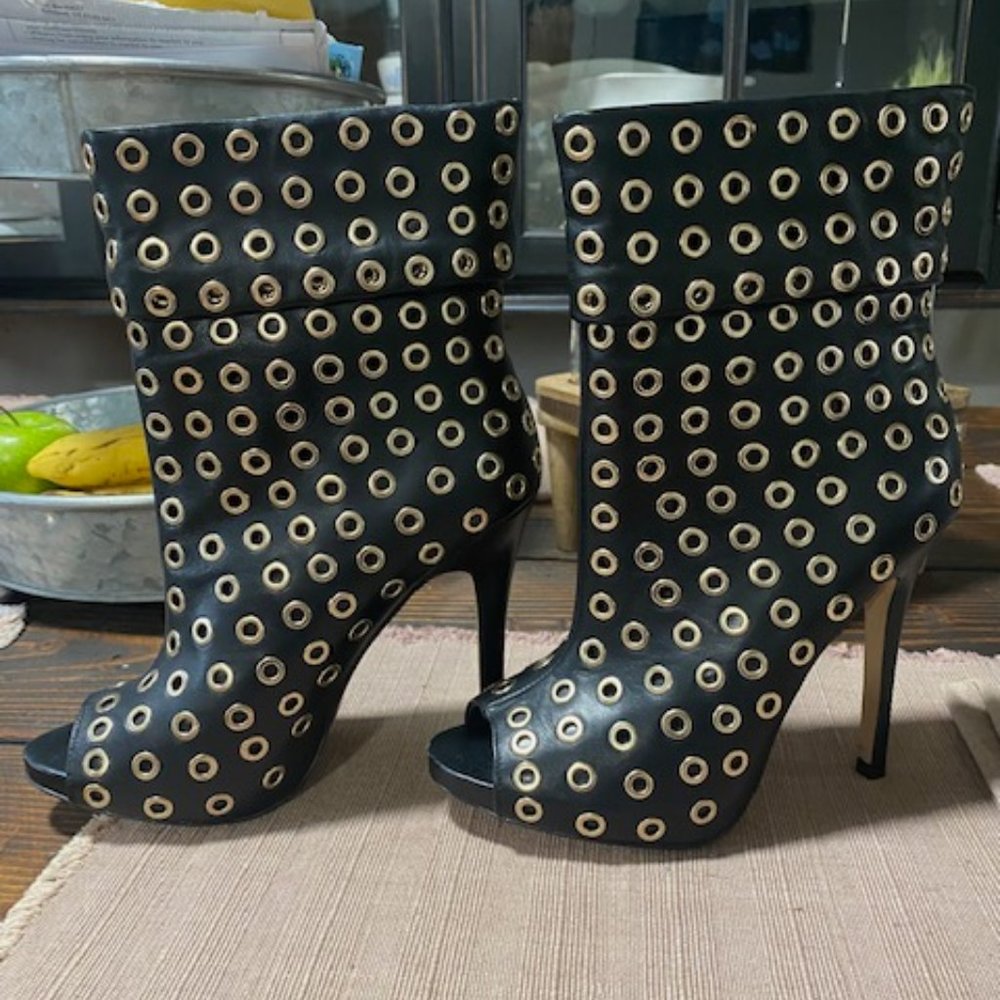aldo ankle black and gold boots